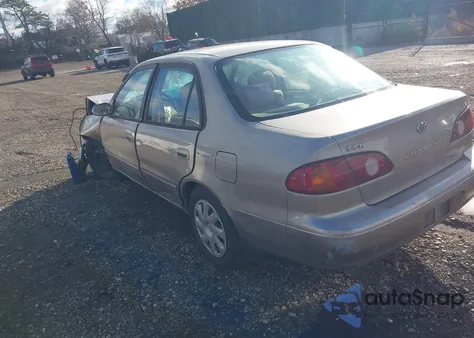 2001 Toyota Corolla Le z USA, uszkodzony, nr VIN 2T1BR12E61C501771